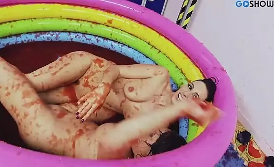 Lesbian Brunette Seductresses in Inflatable Pool